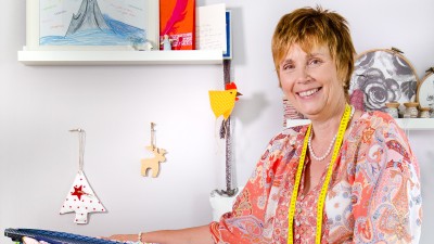 Lachende Frau als Symbolbild für begeisterte Kundinnen